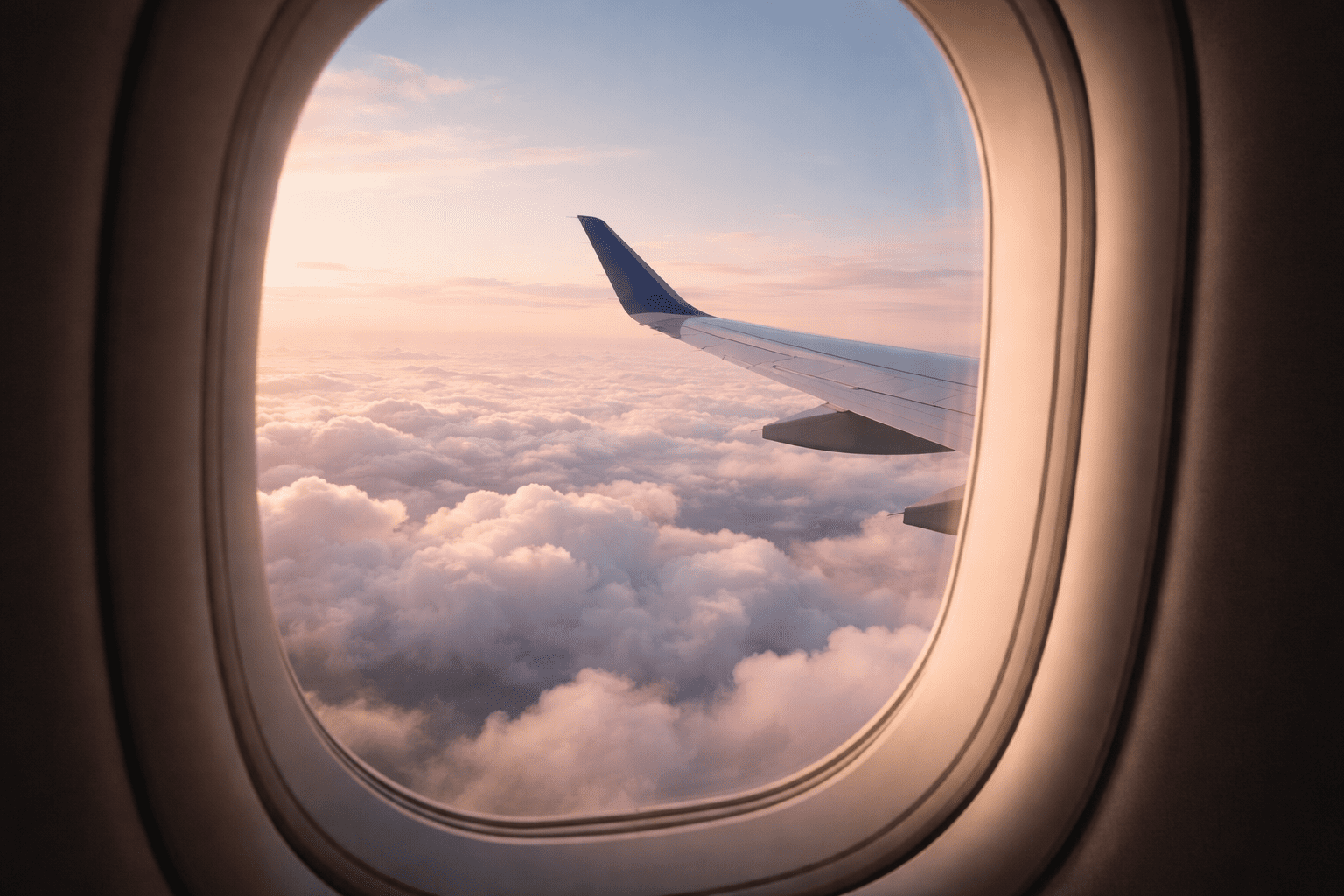 airplane window view during flight after booking cheap tickets